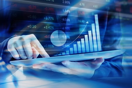 indoor table sitting monitor game screen holding close man water playing player blue television woman ball video pizza display remote