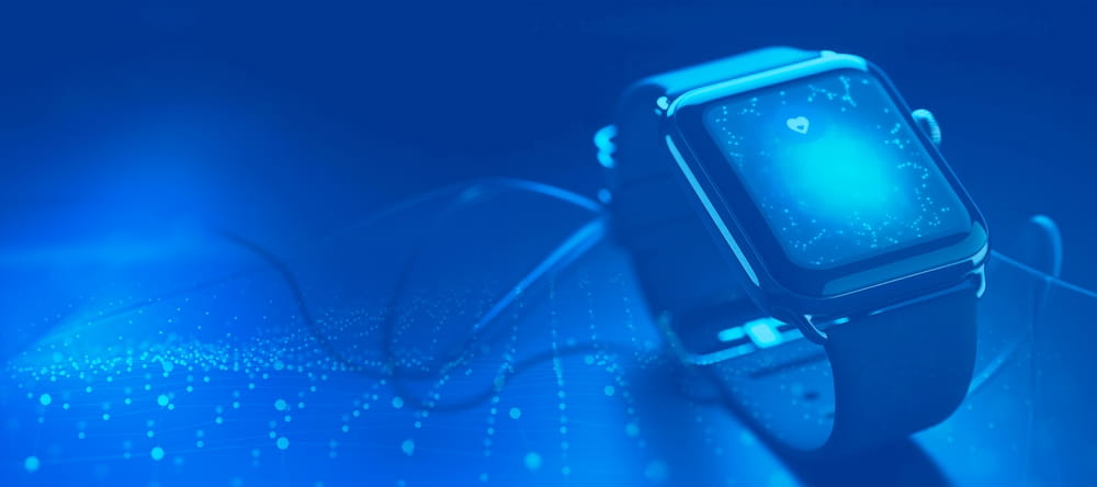 Wearables_Landing_pages.jpg table cellphone indoor sitting phone computer light keyboard laptop surface mouse monitor blue lit desk device water screen remote traffic game video player