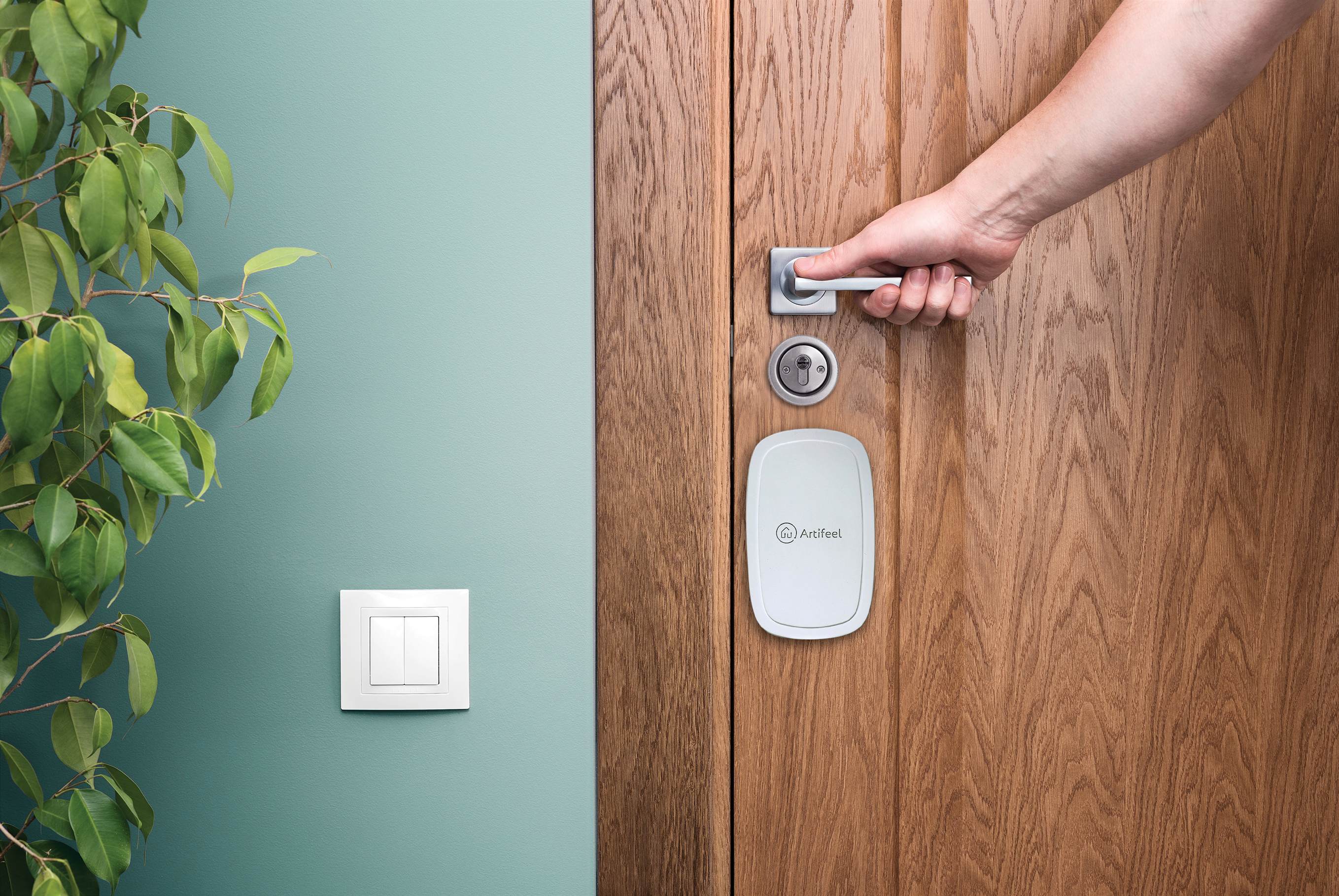 The Artifeel's Check'In mounted on a door