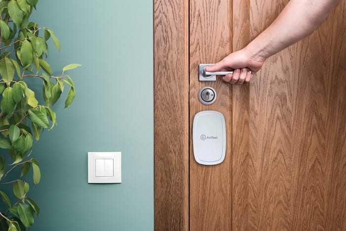 NS_ARTIFEEL-1_WEB.jpg The Artifeel's Check'In mounted on a door