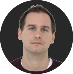 yannis_circle.png a man looking at the camera