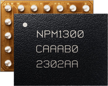 nPM1300_WLCSP_3.1 x 2.4_stacked_web.png Front of an IC saying NPM1300, CAAAB0, 2002AA, with back showing BGA pads