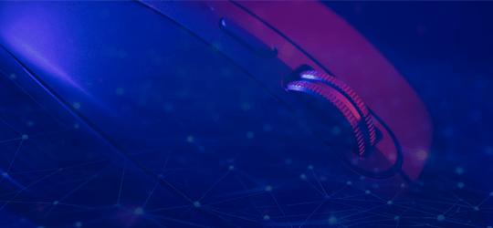 computer sitting keyboard laptop blue light mouse table holding standing man