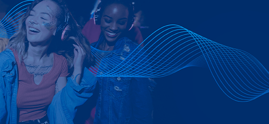 Bluetooth_LE_Audio_promo.png a group of people posing for the camera